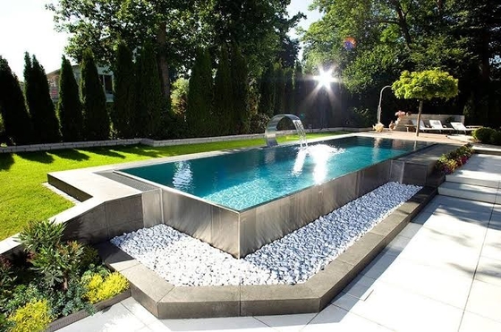 De openlucht van de de Poolvilla van de Roestvrij staalstructuur douane van Lux Relax boven grondpool